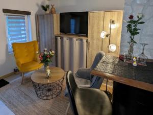 Appartements Maisonnette avec spa : photos des chambres