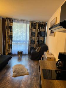 Charmant studio au pieds des remontées mécaniques.