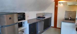 Appartements Gite 3 etoiles - Spacieux et confortable ancienne grange renovee - Cantal Emotions Valette - Auvergne : photos des chambres
