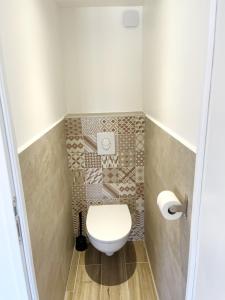 Appartements Duplex Centre Ville - 50m de la Plage - Clim - Garage - Netflix : photos des chambres