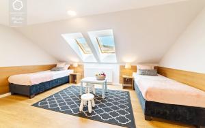 Wonder Home - Apartamenty z balkonami i ogródkami, blisko stoku narciarskiego Karpatka i szlaków turystycznych