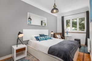 Classy 4BDR Apartment W Balcony by LovelyStay