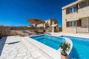 New stone villa with pool near the sandy beach by Traveler tourist agency Krk ID 2372 br 1
