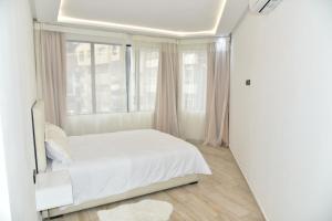 Stylish 3-Bedroom Flat in Kenitra Center Ville with Parking & Comfort