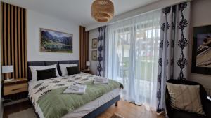 Apartament Czarna Owca - Grapa SUN&SNOW Białka Tatrzańska