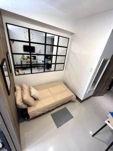 cozy studio unit at fame residence metro manila