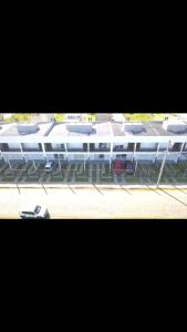 Sobrados com suíte e sacada vista ao mar