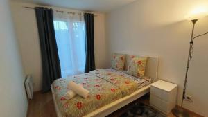 Appartements Appartement cosy a Montmagny : photos des chambres