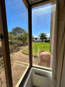 Departamento con vista al mar y jardín privado