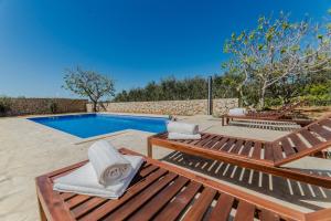 Romantic mediterranean villa with pool near sandy beach by Traveler tourist agency Krk ID 2167