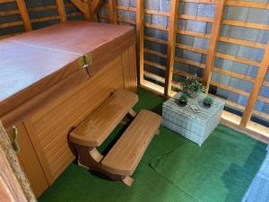 Sejours a la campagne Gite des 2 arbres de la sagesse , agreable chalet avec spa privatif : photos des chambres