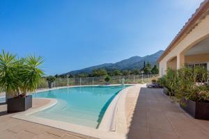 Villas Villa Entre Mer Et Montagnes : photos des chambres