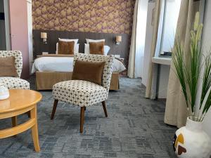 Hotels Cit'Hotel Hotel de France et d'Europe : photos des chambres