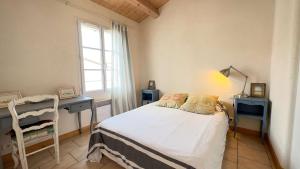 Villas Maison de village a etage : photos des chambres