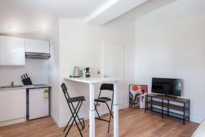 Appartements Lumignons Lyonnais - Doua : photos des chambres