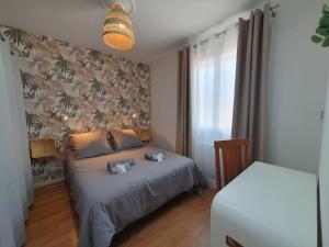 Appartements Le Cosy Paradis par Madame Conciergerie : photos des chambres