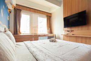 RedLiving Apartemen Patra Land Urbano - Iconic Room Tower Mid-West