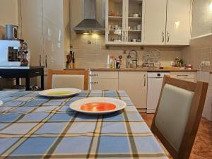 Bright charming house with a garten balkony, panoramic view and full equiped kitchen
