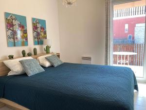 Appartement T2 avec terrasse, parking et WIFI - FR-1-553-203