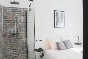 Appartements {Le Factory}, proche EuroAirport : photos des chambres