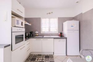 Appartements Sanguinet Charmante maison avec jardin pour 6 personnes : photos des chambres