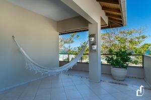 Frente ao mar e próxima a comércios 04 dormitórios