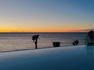 Appartements Pearl Beach - Rooftop Pool Seaside : photos des chambres