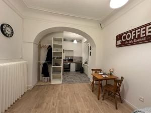 Appartements Le Petit Cafe - Centre ville, parking gratuit : photos des chambres