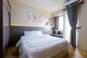 RedLiving Apartemen Riverview Residence - SB Room Tower Mahakam with Netflix - Tegalgede