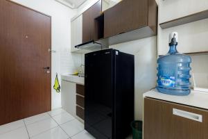 RedLiving Apartemen Riverview Residence - UV Rooms Tower Mahakam with Netflix
