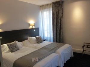 Hotels Logis Le Midland : photos des chambres