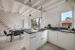 Maisons de vacances Maison renovee pour 8 - 200m Tharon plage : photos des chambres