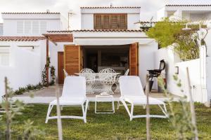 Casa junto al mar, golf, piscina y piscina relax