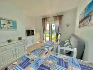 Pura Vida -Apartamento con piscina junto la playa