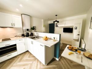 Appartements La Maison Hugo : photos des chambres