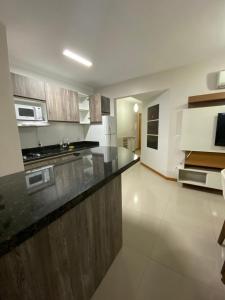 Apartamento NOVO completo com garagem e suíte no centro NÃO ACEITAMOS ANIMAIS