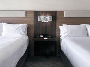 Standard Queen Room with Two Queen Beds room in Holiday Inn Express Hotel & Suites Ennis an IHG Hotel