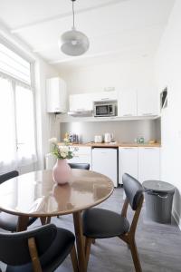 Appartements AppartUnique - Chez Murillo : photos des chambres