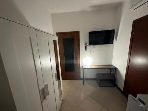 Flower City, rooms con cucina in comune e terrazza