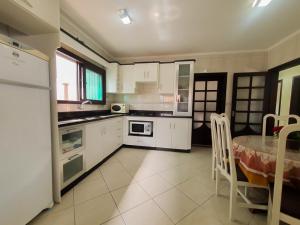 CENTRO DE XANGRI-LÁ COM PISCINA