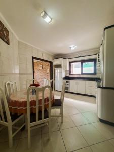 CENTRO DE XANGRI-LÁ COM PISCINA