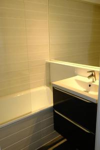 Appartements Studio - centre station : photos des chambres