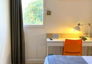 Hotels Kyriad Argenteuil : photos des chambres