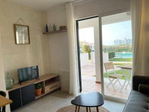 Xoriguer -Apartamento con piscina junto la playa