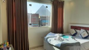 Queen Isis pyramids view