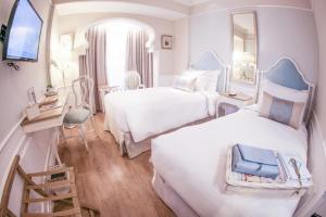 Phòng Hai Giường Đơn Loại Sang (Deluxe Twin Room)