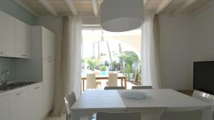 Villaggio dei Pellicani Apartments