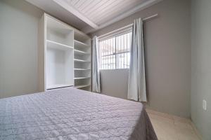 097 - Apto econômico de 02 quartos em Canto Grande