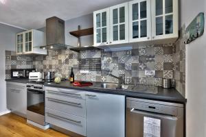 Maisons de vacances LocaLise - M26 - Ty Vakansou - Maison avec jardin au Guilvinec - Tout a pied, plage, port, centre - Wifi inclus - Draps inclus - Animaux non admis : photos des chambres