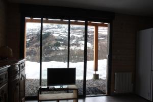 Appartements Appartement en rdc d'un chalet : photos des chambres